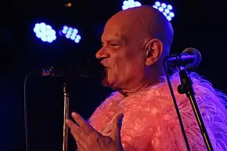 Slater performing with Freak Power