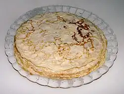 Frixuelos. This is a kind of crêpe made in Asturias, Spain.