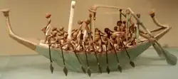A model of a paddling funerary boat, painted and gessoed wood, originally from Thebes from TT280