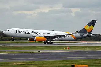 An AirTanker demilitarised Airbus A330-243 G-VYGK (MSN: 1498) wet-leased to Thomas Cook Airlines at Manchester Airport, 2015.