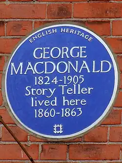 Blue plaque at No. 20, commemorating George MacDonald