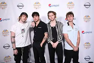 Image 104Typical late 2010s fashion of Australian band 5 Seconds of Summer in 2018 (from 2010s in fashion)