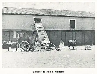 loading grain elevator, Spain