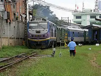 A passenger train departs Ga Sài Gòn station in 2010