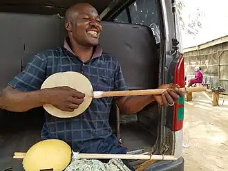 Niger and northern Nigeria. Fulani musician playing a gourd bodied garaya. The Hausa also make the instrument, with a wood body.[140][141]