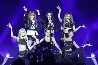 Genblue in December 2024 Top, L–R: Nico, Ayeon, Yuan Bottom, L–R: Lili, Xxin, Ayako