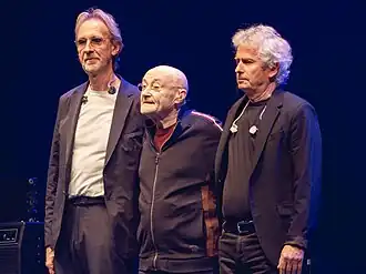 Genesis onstage, taking end-of-concert bow