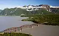 Aerial view of Goat Mountain, Miles Lake (left), Miles Glacier Bridge, and Copper River (right)