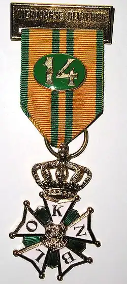 Cross in gold, 11th year. 1977–2009