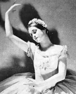 Grace Cornell, a young white woman, in a balletic dance pose