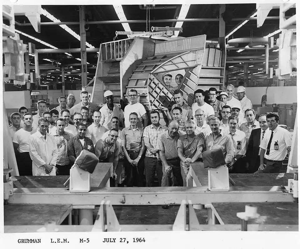 Grumman Aircraft Engineering Corporation manufacturing team with Lunar Module TM-5 ascent stage fuselage.