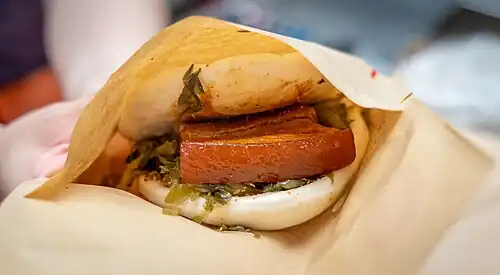 With Dongpo pork and suan cai