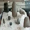 Collection of stone axes and other cutting tools