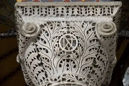 Byzantine monogram of Justinian I in Hagia Sophia, Istanbul, Turkey, unknown sculptor, capital designed by Anthemius of Tralles and Isidore of Miletus, 537