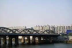 Sign with name of bridge at one end (2020)