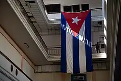 A Cuban flag hanging inside the station building