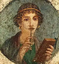 Image 14Woman holding wax tablets in the form of the codex. Wall painting from Pompeii, before 79 CE. (from History of books)