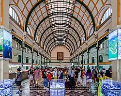 Interior view of the Saigon Central Post Office with portrait of Ho Chi Minh centrally on the back wall