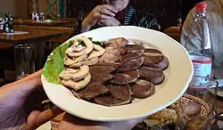 Horse meat platter. Kazakh cuisine revolves around mutton, horse meat and various milk products.