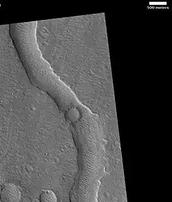 A location in the Hypanis Valles, as seen by HiRISE (scale bar is 500 m)