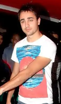 Young man in a multicolored T-shirt