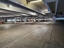 Interior view of a parking garage with no vehicles