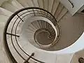 Interior view down spiral staircase tower