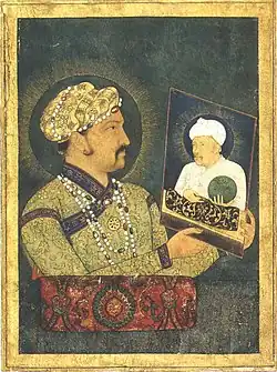 painting of Jahangir (Salim) holding a painting of Akbar