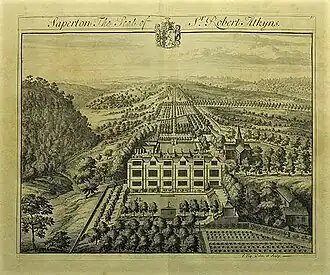 Seventeenth century manor house in formal gardens and farmland