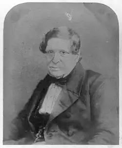 Monochrome photograph of Lord Lyndhurst seated wearing a suit