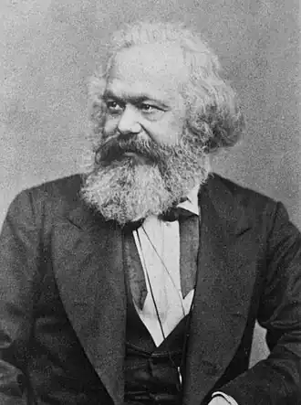 Black-and-white portrait photograph of Marx facing left