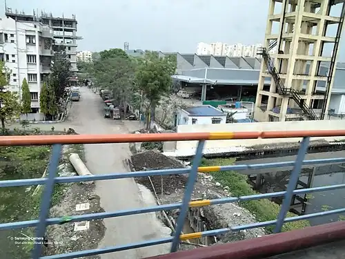 Kavi Subhash metro station depot and carshed as seen from Orange Line