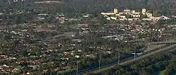 Aerial view over northern residential parts of Kew looking southwest showing Studley Park (top), Kew Asylum (right) and Eastern Freeway Earl Street exit (bottom right)