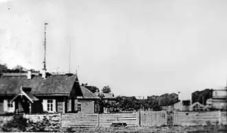 Vintage black and white photo of the Kharkiv Observatory with a large, domed telescope building and other structures.