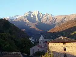 Saint Mesrop Mashtots Church with Khustup in the background