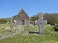 Ogham stone, church, stone cross