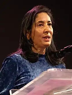 Desai reading on behalf of Salman Rushdie at the 2024 National Book Awards finalist reading