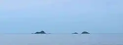 Ko Sai island (left) seen from the shore. Ko Khi Nok (center) and Ko Sadao island (right) are smaller.
