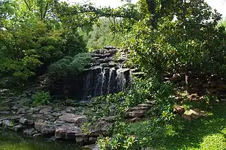 Waterfall in a garden area.