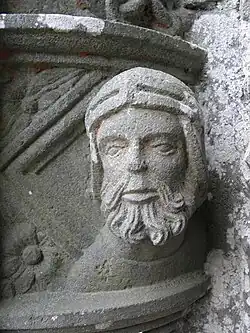 Carving on the stoup by south porch