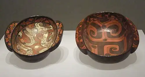 Lacquered flanged cup with cloud designs from Warring States.