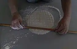 Petë stack pressed and bound with a criss-cross pattern