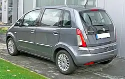 Rear of a facelifted model, distinguished by lower rear lights or reflectors, restyled taillights, and other cosmetic changes to the trim