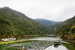 River with a fish farm