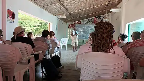 Director of Villa Karo Mr Kwassi Akpladokou giving a lecture to the visitors.