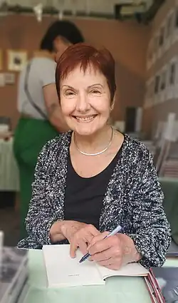 Louise Dupré signing the new edition of her poetry collection Tout près (Paris, 2024)