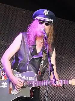 Cope performing in 2015