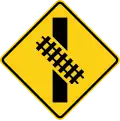 W10-12L Skewed crossing ahead (left) (this supplements the W10-1 sign but does not replace it)