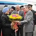 Omar Abdullah welcomes Prime Minister Manmohan Singh on his arrival at Jammu airport in 2011.