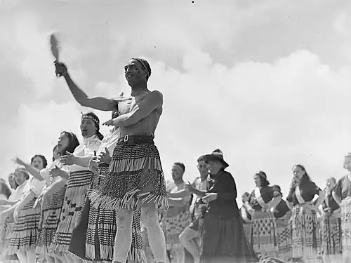Maori cultural group performing, wearing piupiu c. 1943